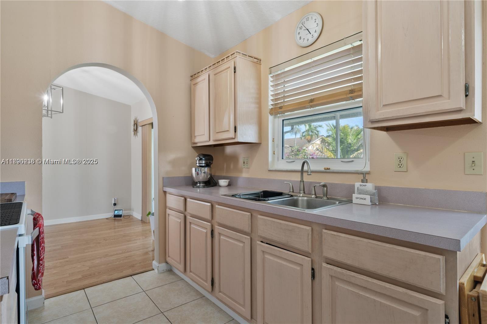 13752 Southwest 285th Street Homestead, FL 33033 - Photo 19 of 25 a kitchen with a sink and cabinets