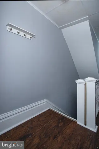 a view of a swimming pool with lounge chairs