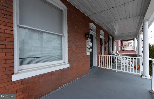 a view of a porch of a house