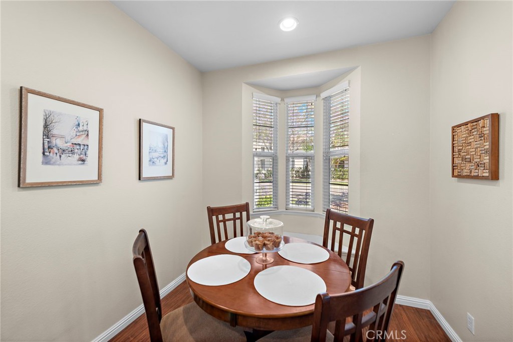 81 Mercantile Way Ladera Ranch, CA 92694 - Photo 14 of 51 a view of a dining room with furniture window and wooden floor