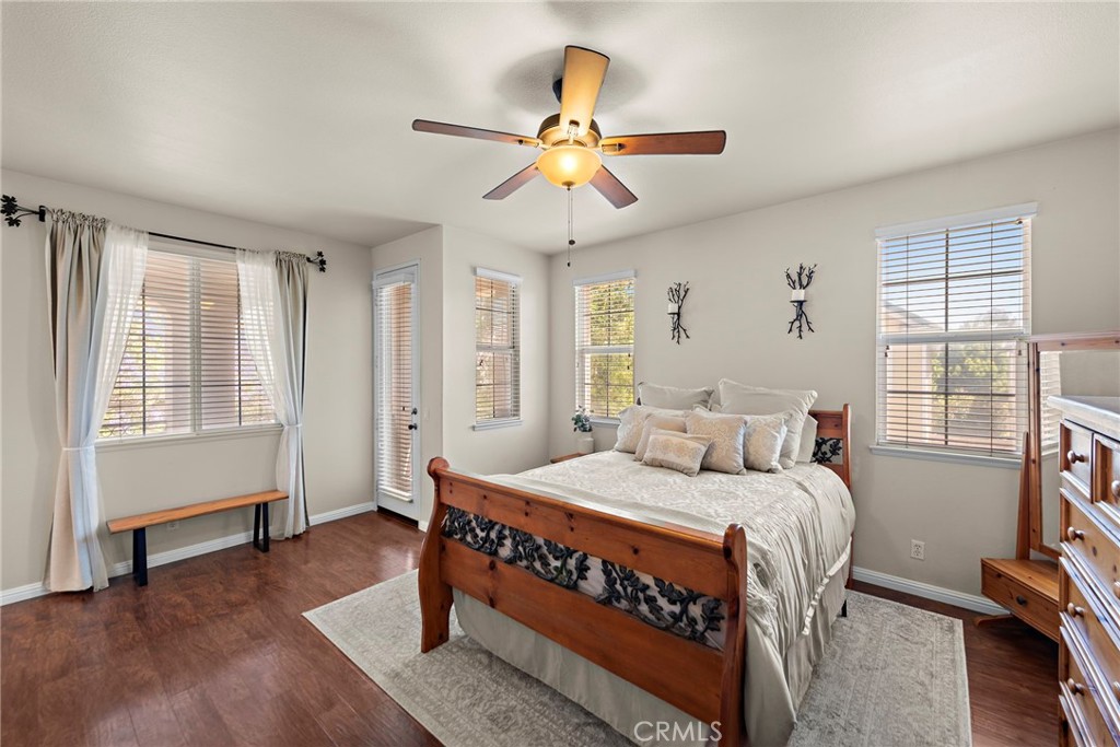 81 Mercantile Way Ladera Ranch, CA 92694 - Photo 17 of 51 a bedroom with a bed and a chandelier