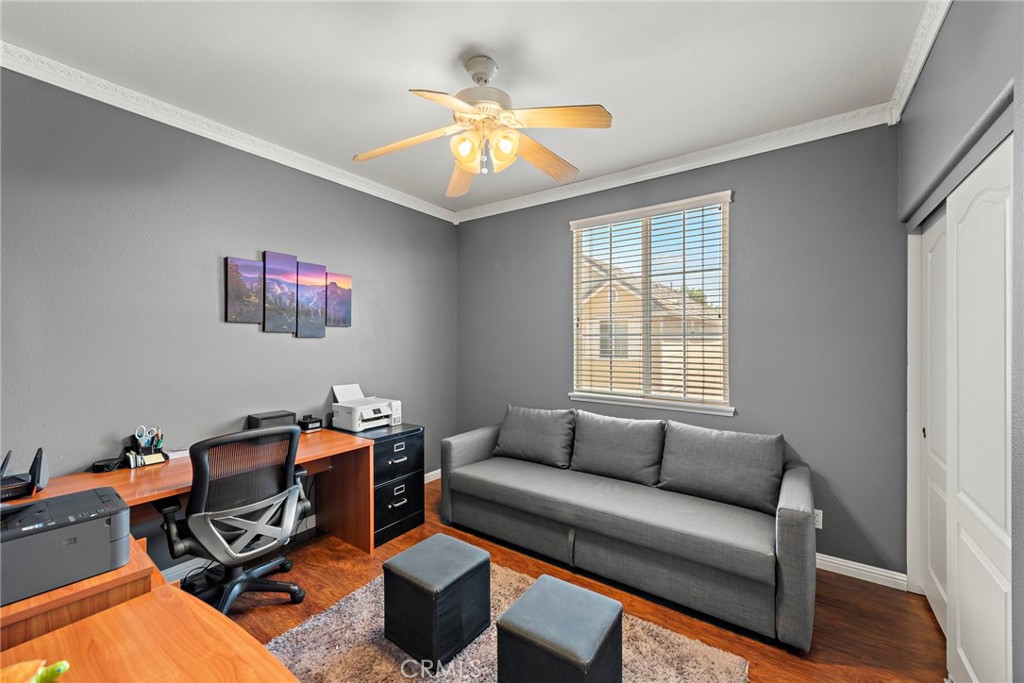 81 Mercantile Way Ladera Ranch, CA 92694 - Photo 22 of 51 a living room with furniture and a chandelier