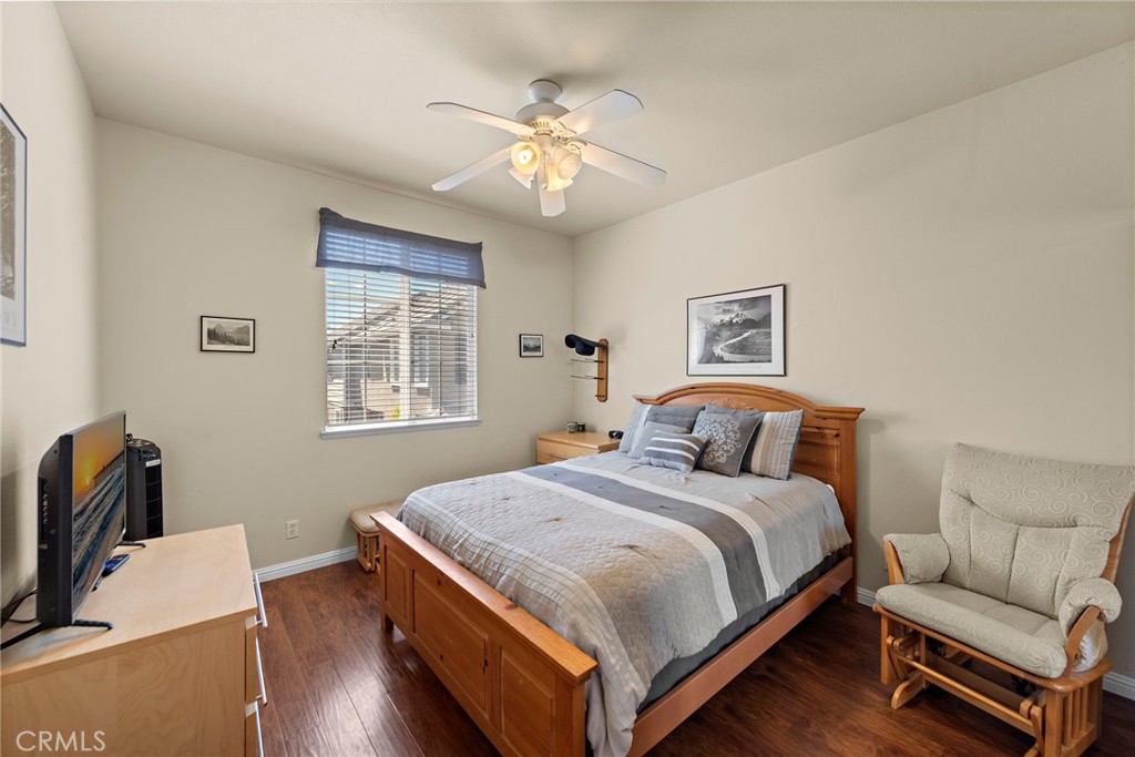 81 Mercantile Way Ladera Ranch, CA 92694 - Photo 23 of 51 a bedroom with a bed and a couch