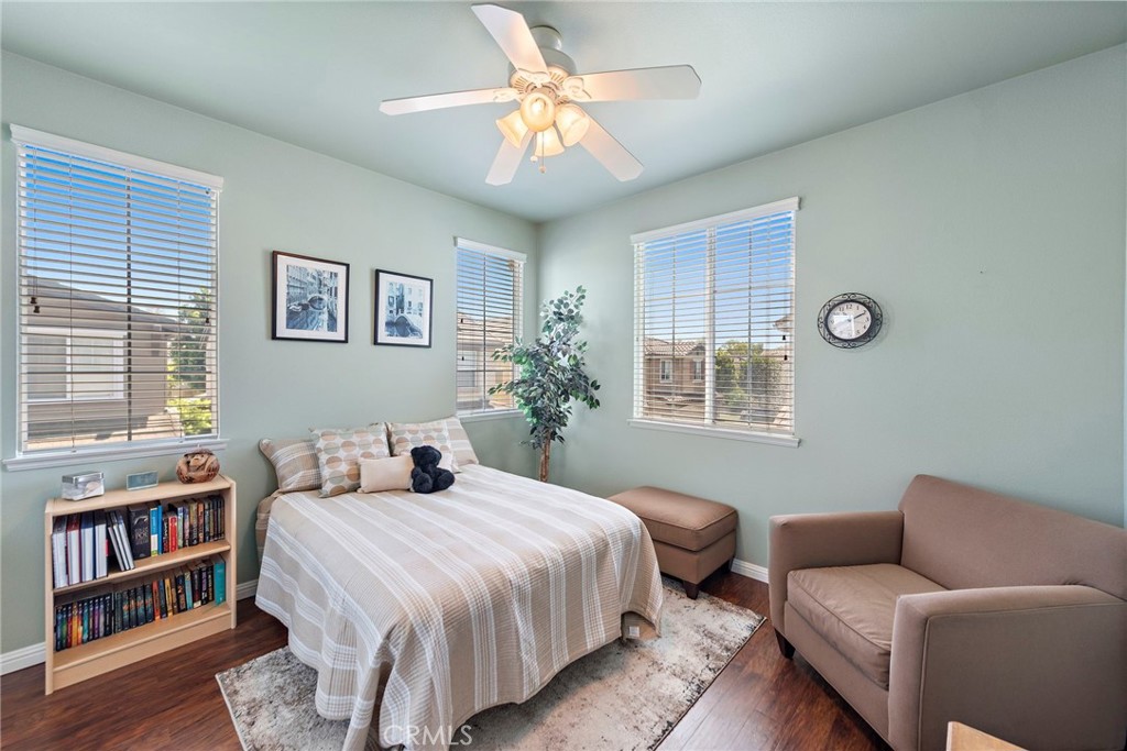 81 Mercantile Way Ladera Ranch, CA 92694 - Photo 24 of 51 a bedroom with a bed furniture and a window