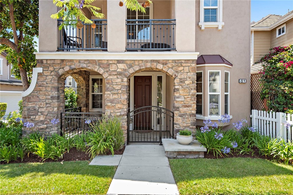 81 Mercantile Way Ladera Ranch, CA 92694 - Photo 30 of 51 a front view of a house with a garden