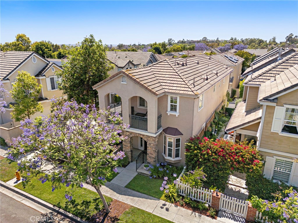 81 Mercantile Way Ladera Ranch, CA 92694 - Photo 36 of 51 front view of a house with a garden