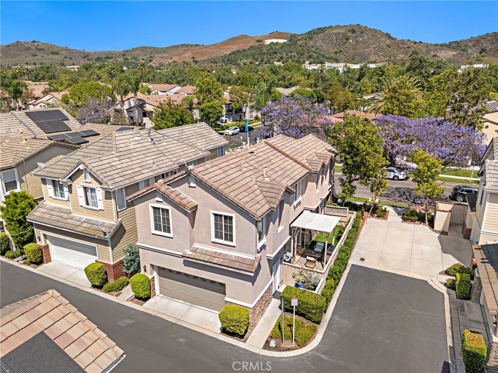 81 Mercantile Way Ladera Ranch, CA 92694 - Photo 39 of 51 an aerial view of a house with a garden