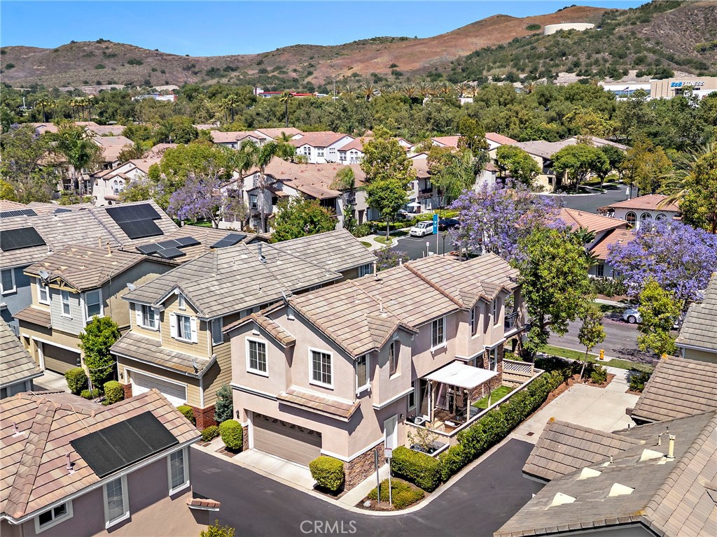 81 Mercantile Way Ladera Ranch, CA 92694 - Photo 41 of 51 an aerial view of a house with a garden