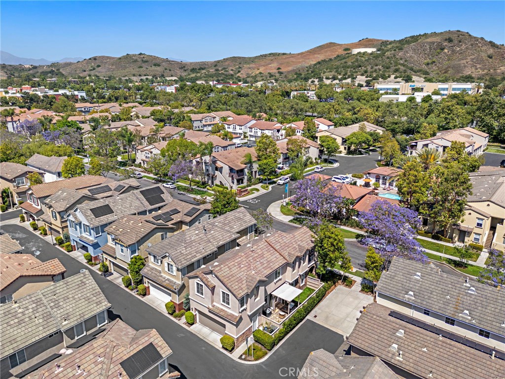 81 Mercantile Way Ladera Ranch, CA 92694 - Photo 42 of 51 an aerial view of residential house with outdoor space and mountain view