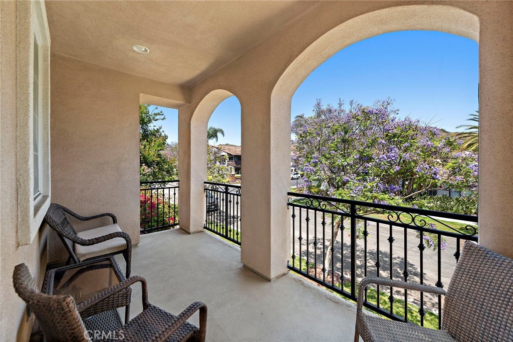 81 Mercantile Way Ladera Ranch, CA 92694 - Photo 7 of 51 a view of a balcony with chairs