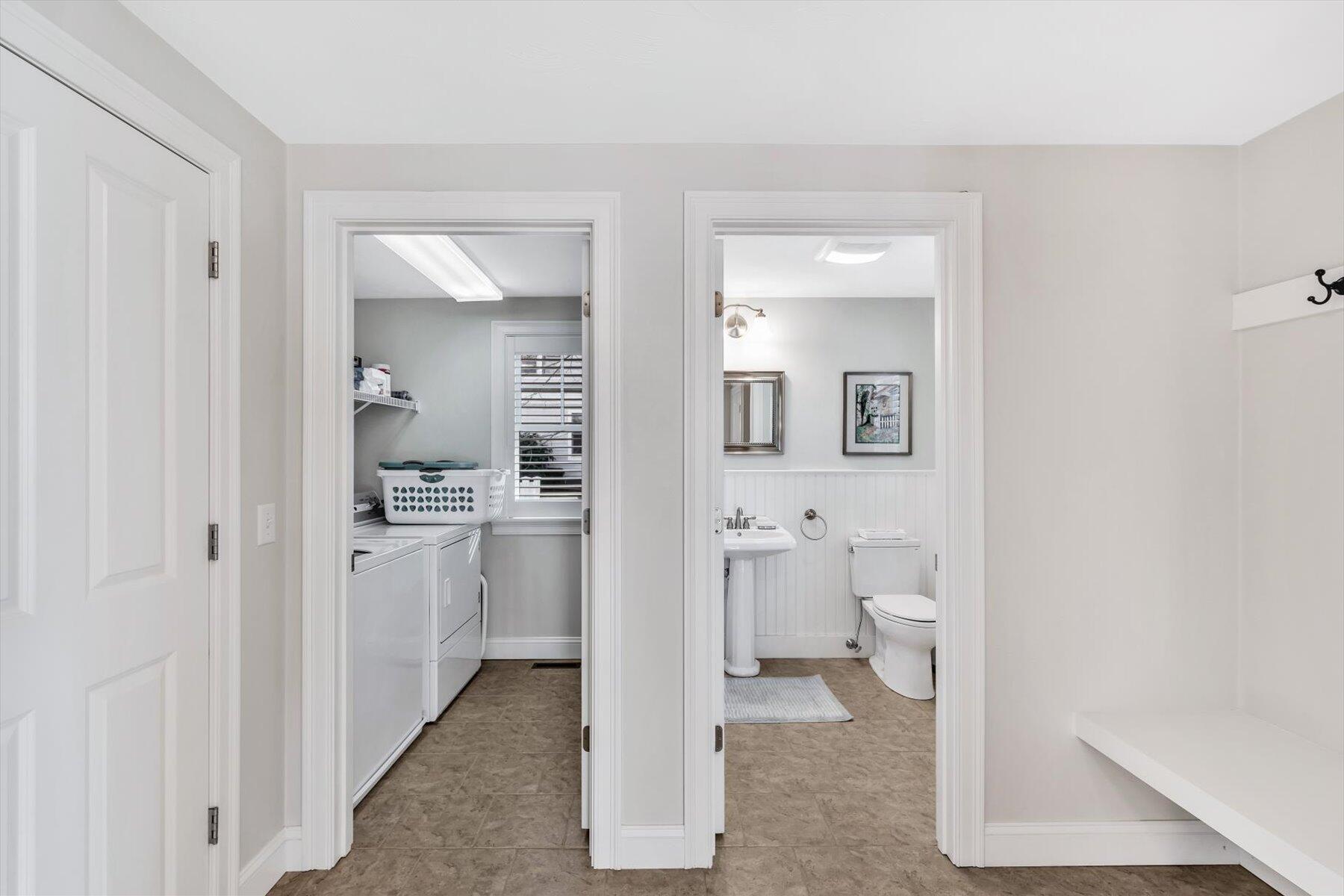 66 Eagle Drive Mashpee, MA 02649 - Photo 13 of 36 a bathroom with a toilet sink and a mirror