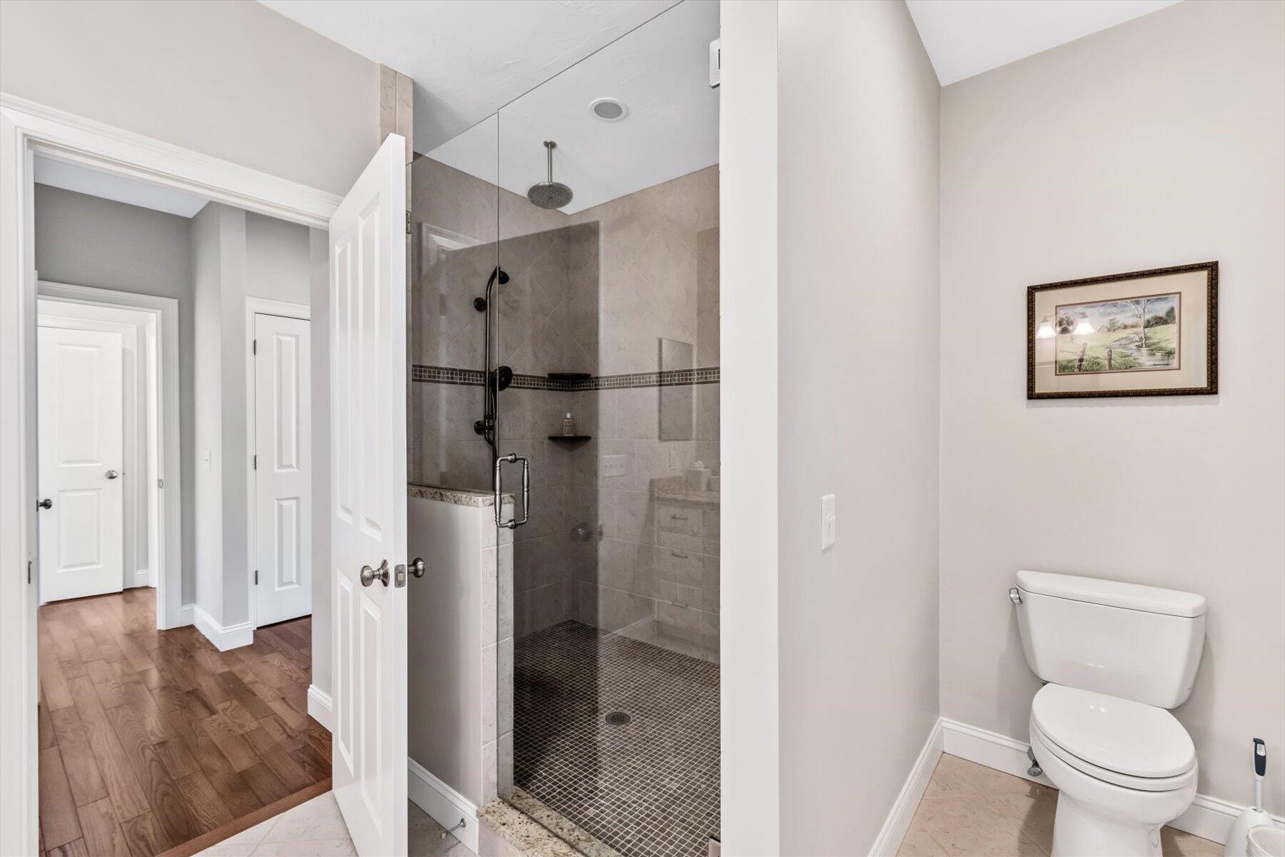 66 Eagle Drive Mashpee, MA 02649 - Photo 15 of 36 a bathroom with a toilet and a shower