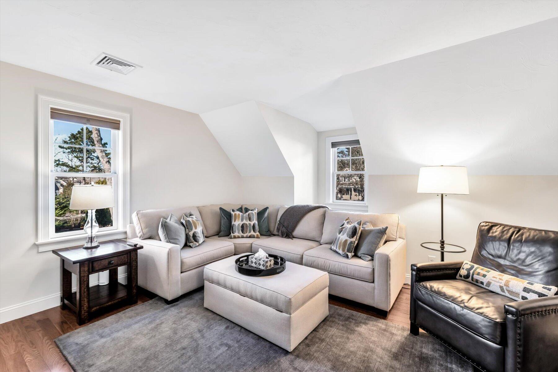 66 Eagle Drive Mashpee, MA 02649 - Photo 18 of 36 a living room with furniture and a large window