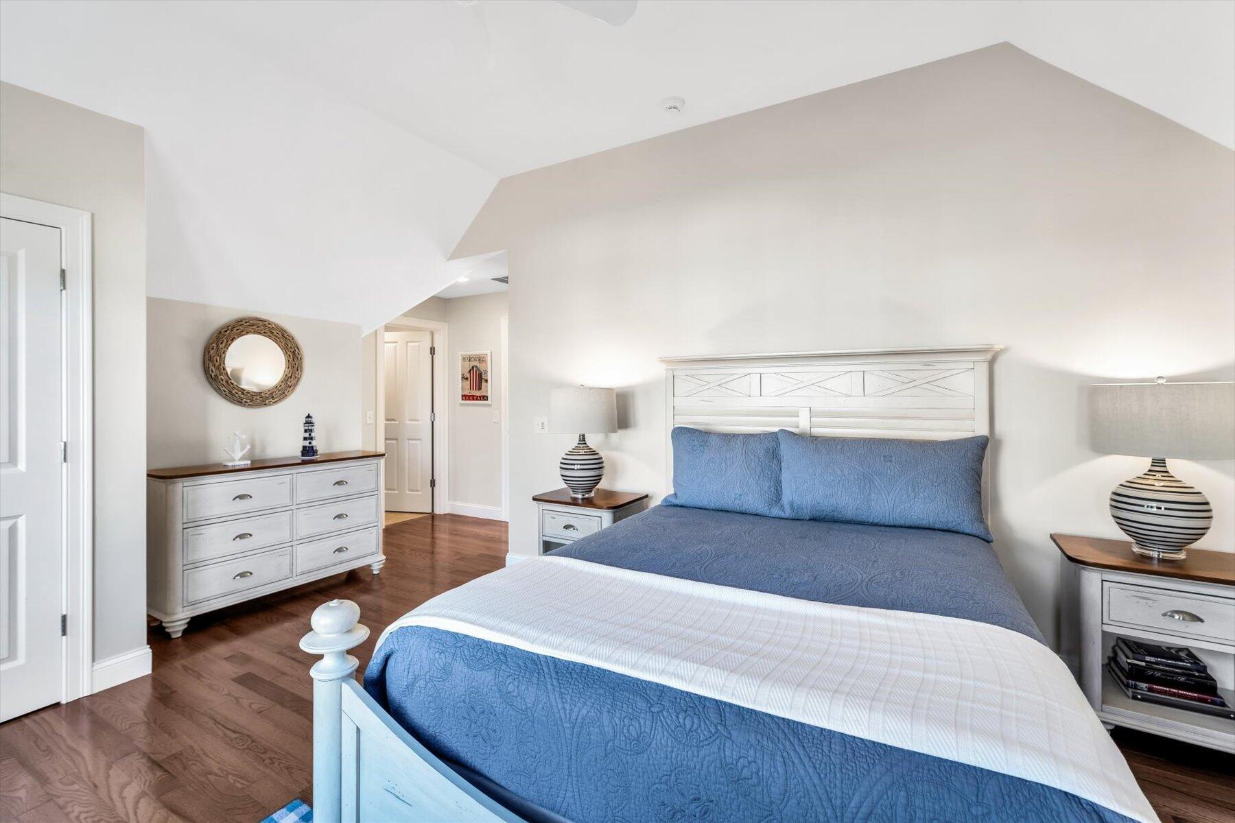 66 Eagle Drive Mashpee, MA 02649 - Photo 19 of 36 a bedroom with a bed and a dresser