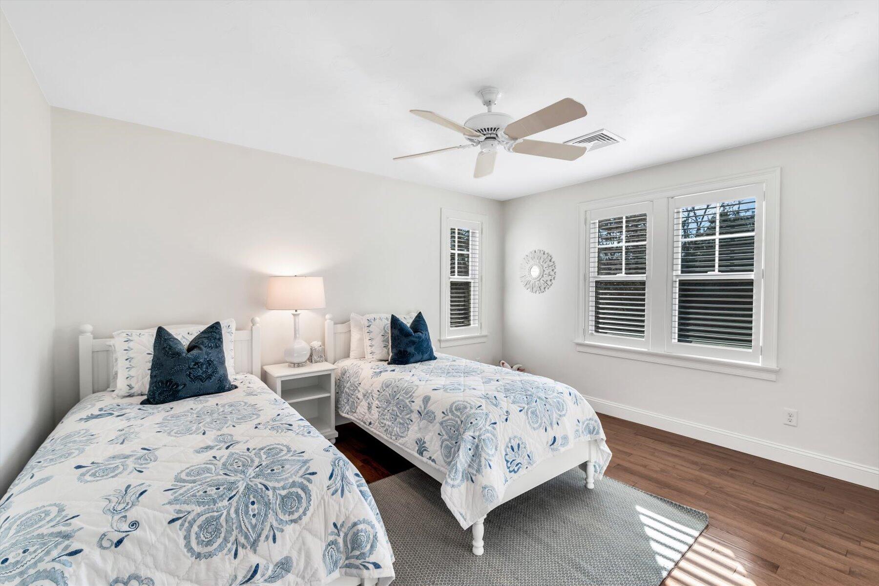 66 Eagle Drive Mashpee, MA 02649 - Photo 23 of 36 a bedroom with two beds and a window