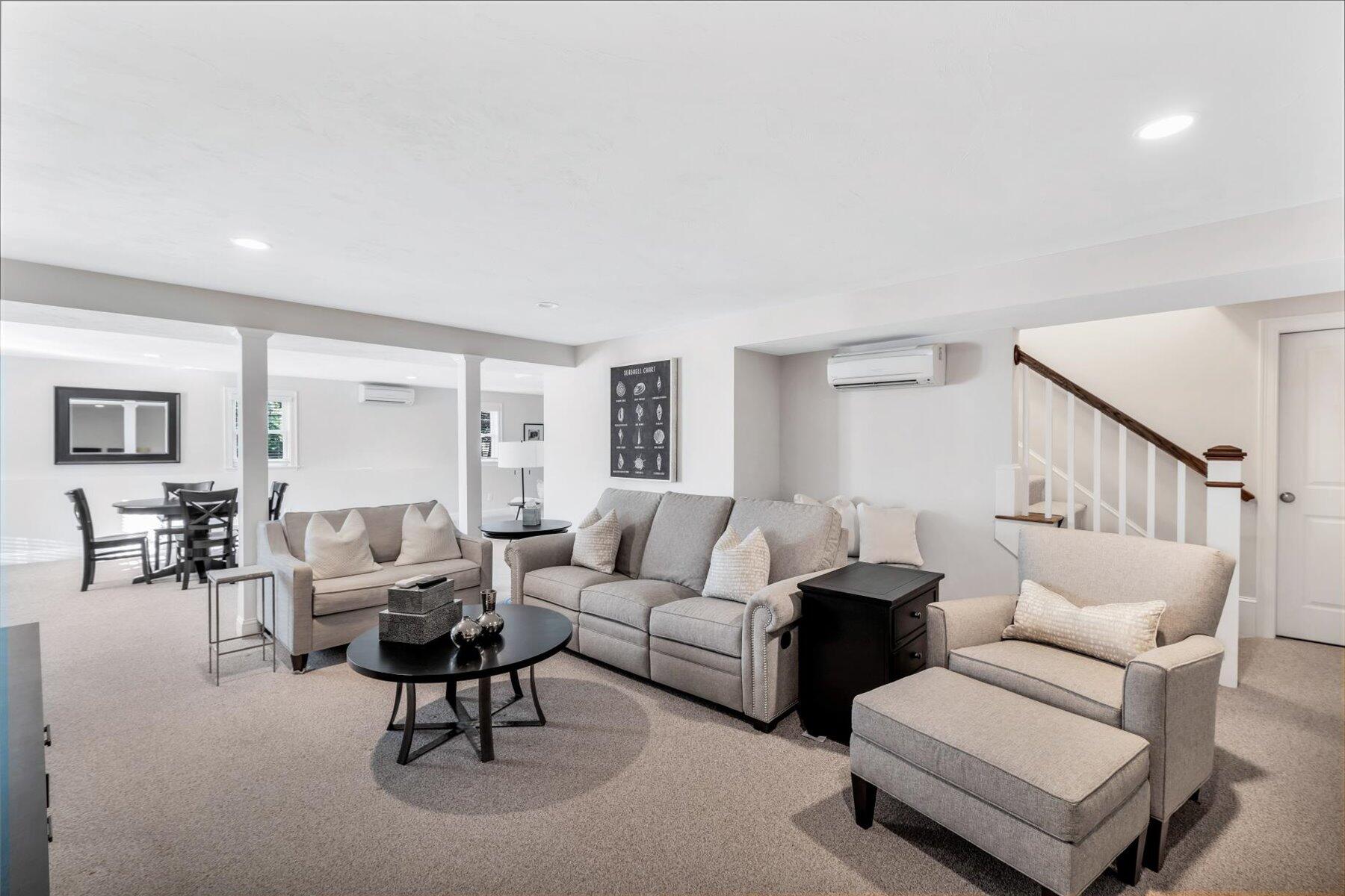 66 Eagle Drive Mashpee, MA 02649 - Photo 24 of 36 a living room with furniture and a table