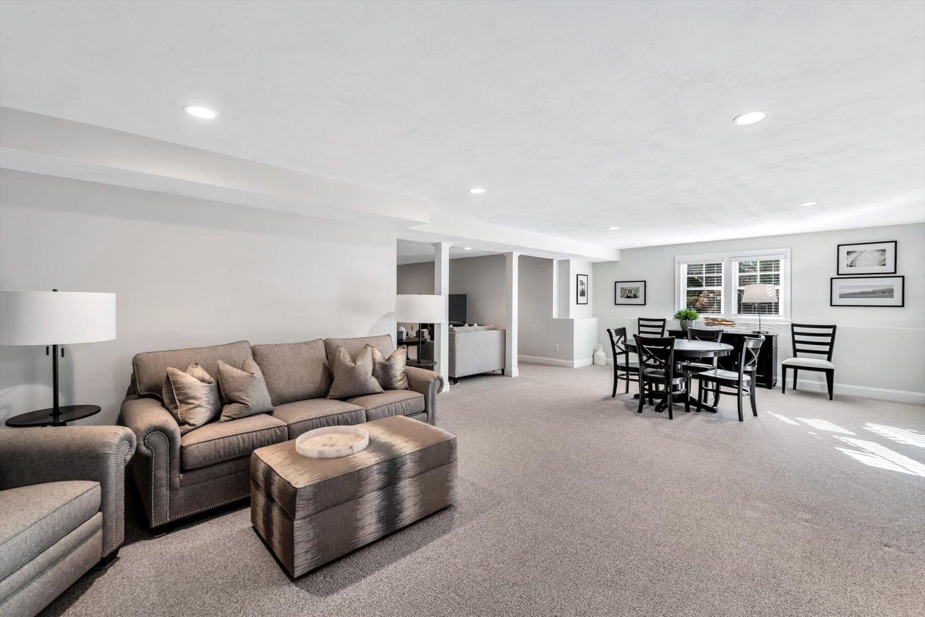 66 Eagle Drive Mashpee, MA 02649 - Photo 27 of 36 a living room with furniture and dining area