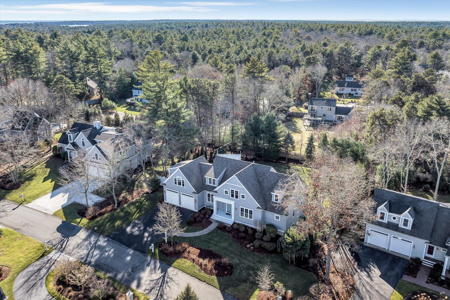 66 Eagle Drive Mashpee, MA 02649 - Photo 34 of 36 an aerial view of a house with a yard
