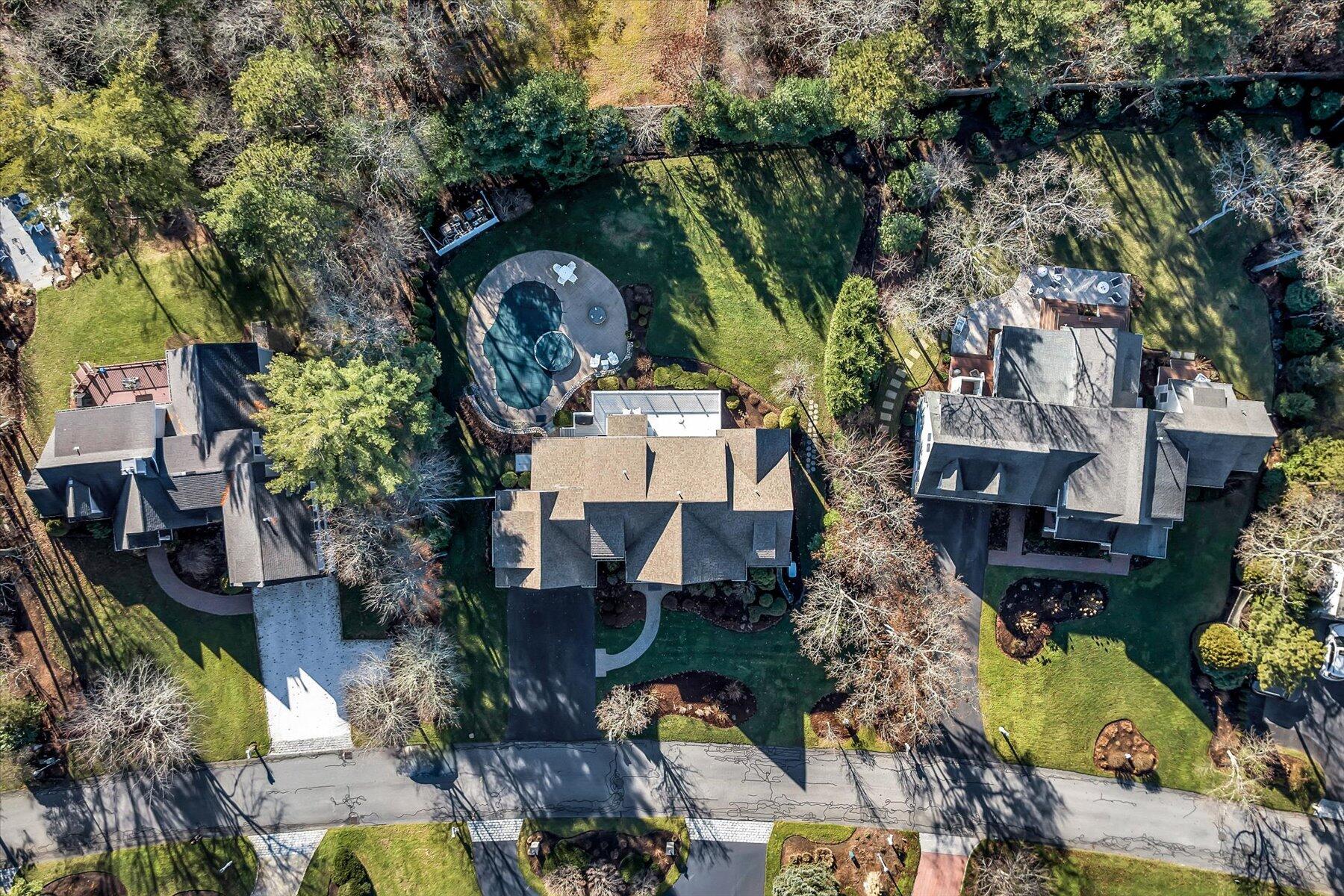 66 Eagle Drive Mashpee, MA 02649 - Photo 35 of 36 an aerial view of a house with a yard basket ball court and outdoor seating