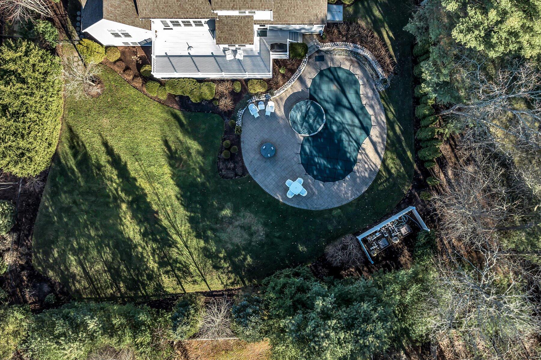66 Eagle Drive Mashpee, MA 02649 - Photo 36 of 36 an aerial view of a house with outdoor space and a lake view