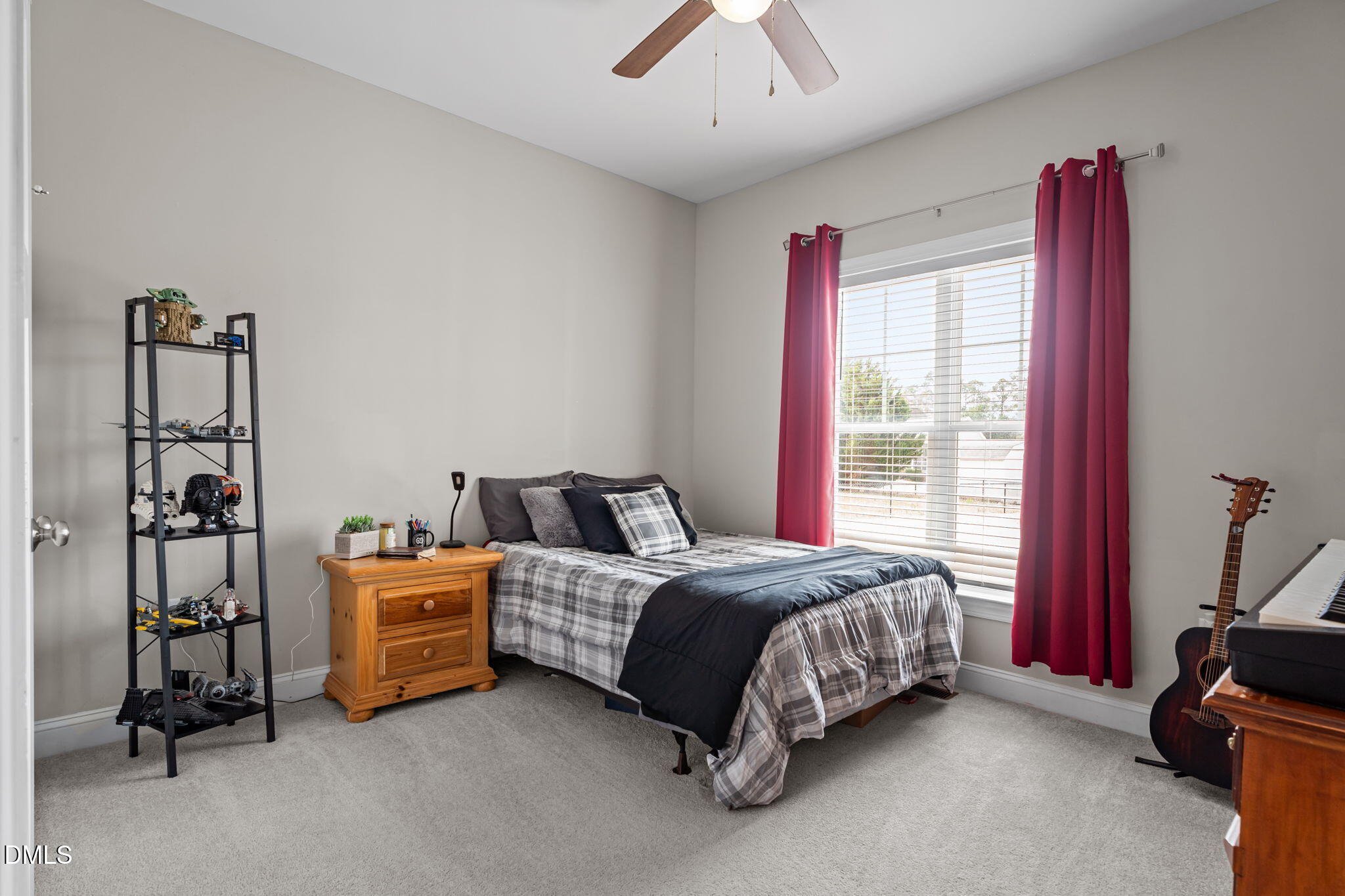 8772 Surrey Top Road Bailey, NC 27807 - Photo 23 of 42 a bed room with a bed and a window