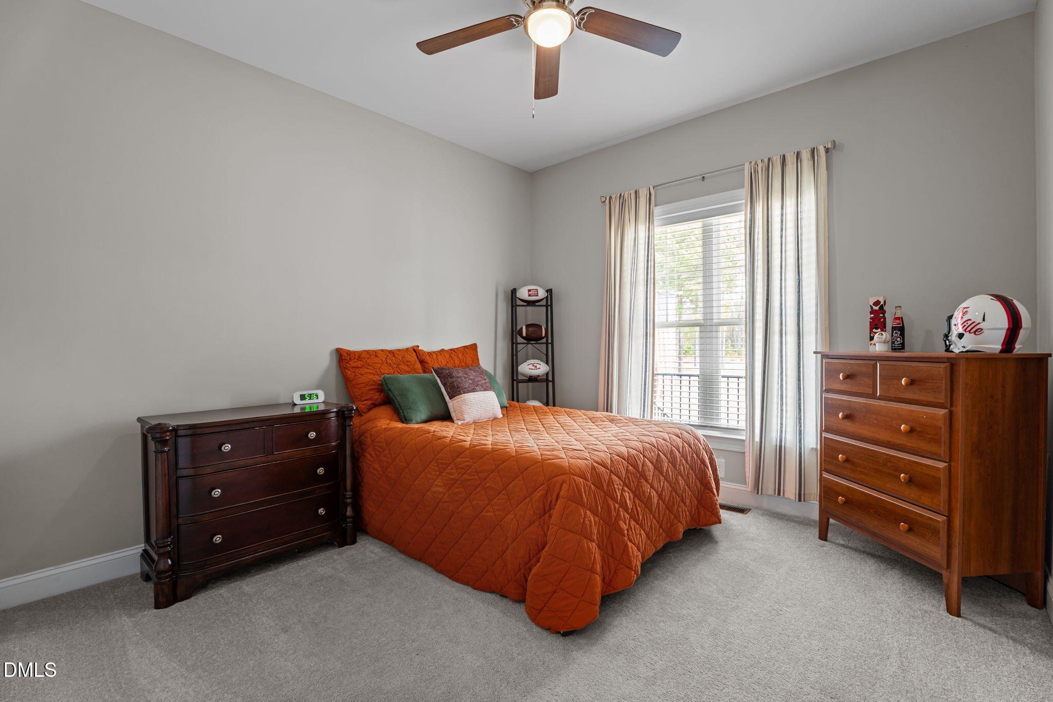 8772 Surrey Top Road Bailey, NC 27807 - Photo 25 of 42 a bed room with a bed and a dresser