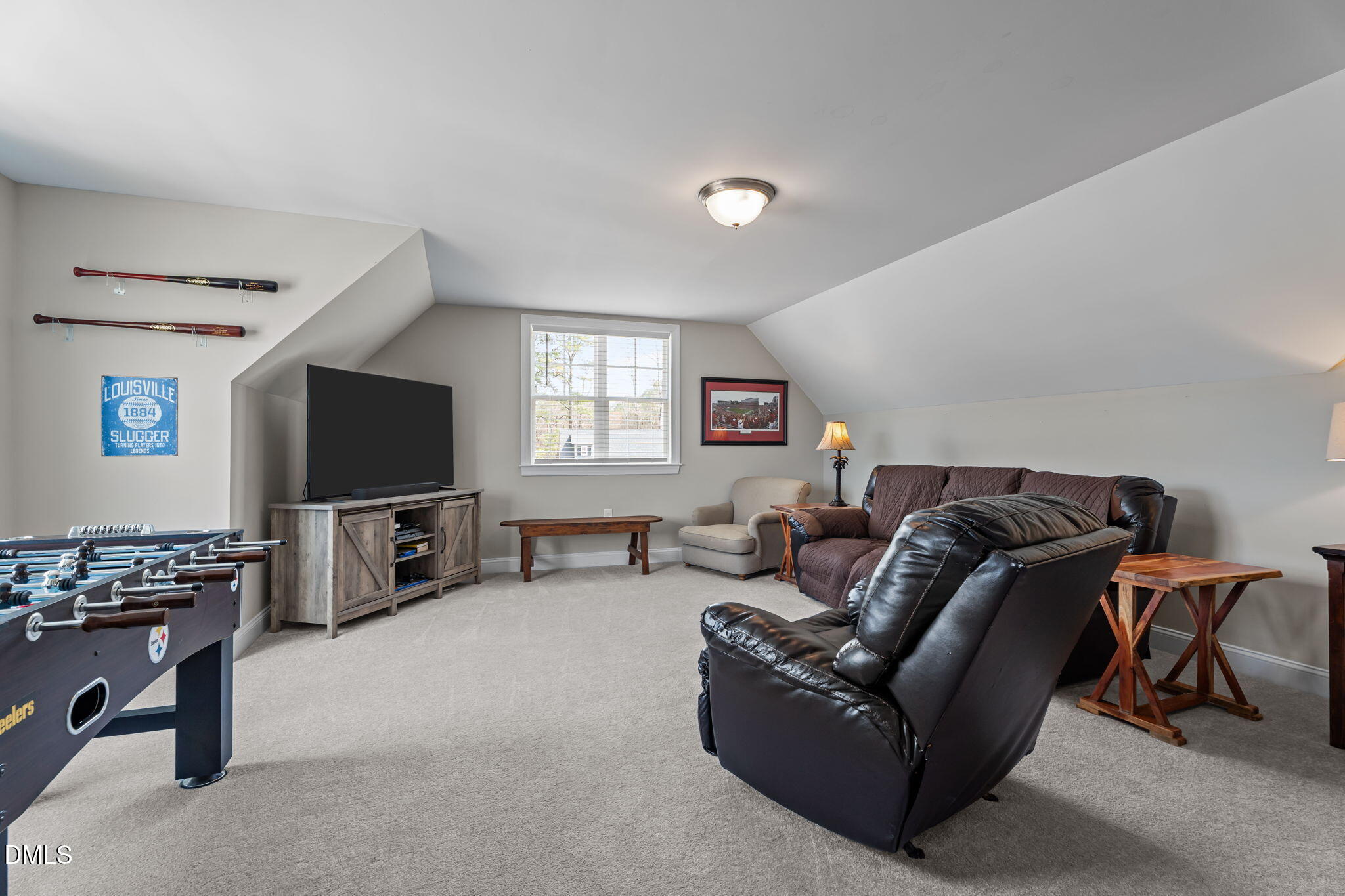 8772 Surrey Top Road Bailey, NC 27807 - Photo 29 of 42 a living room with furniture and a flat screen tv