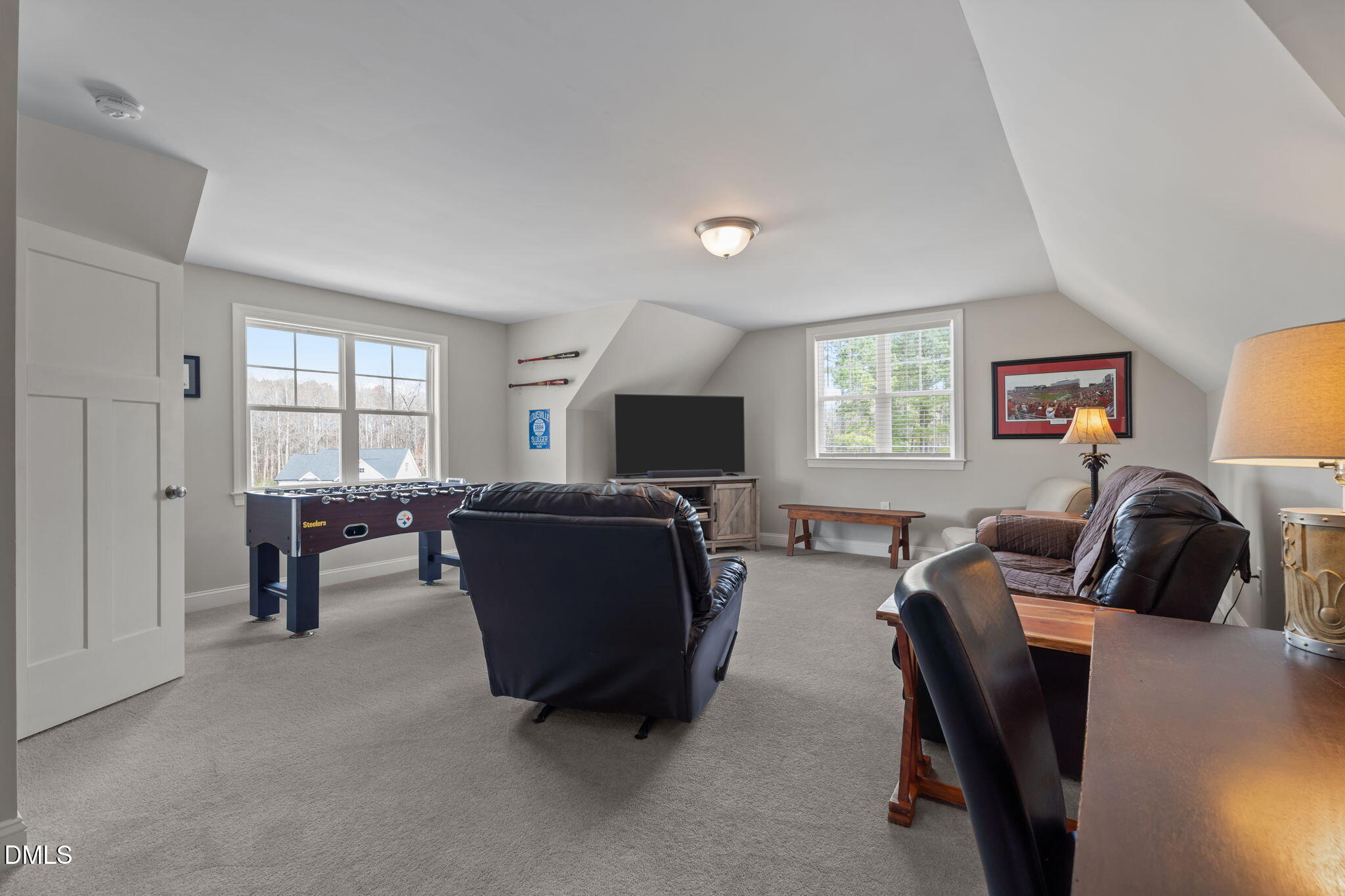 8772 Surrey Top Road Bailey, NC 27807 - Photo 30 of 42 a living room with furniture and a flat screen tv