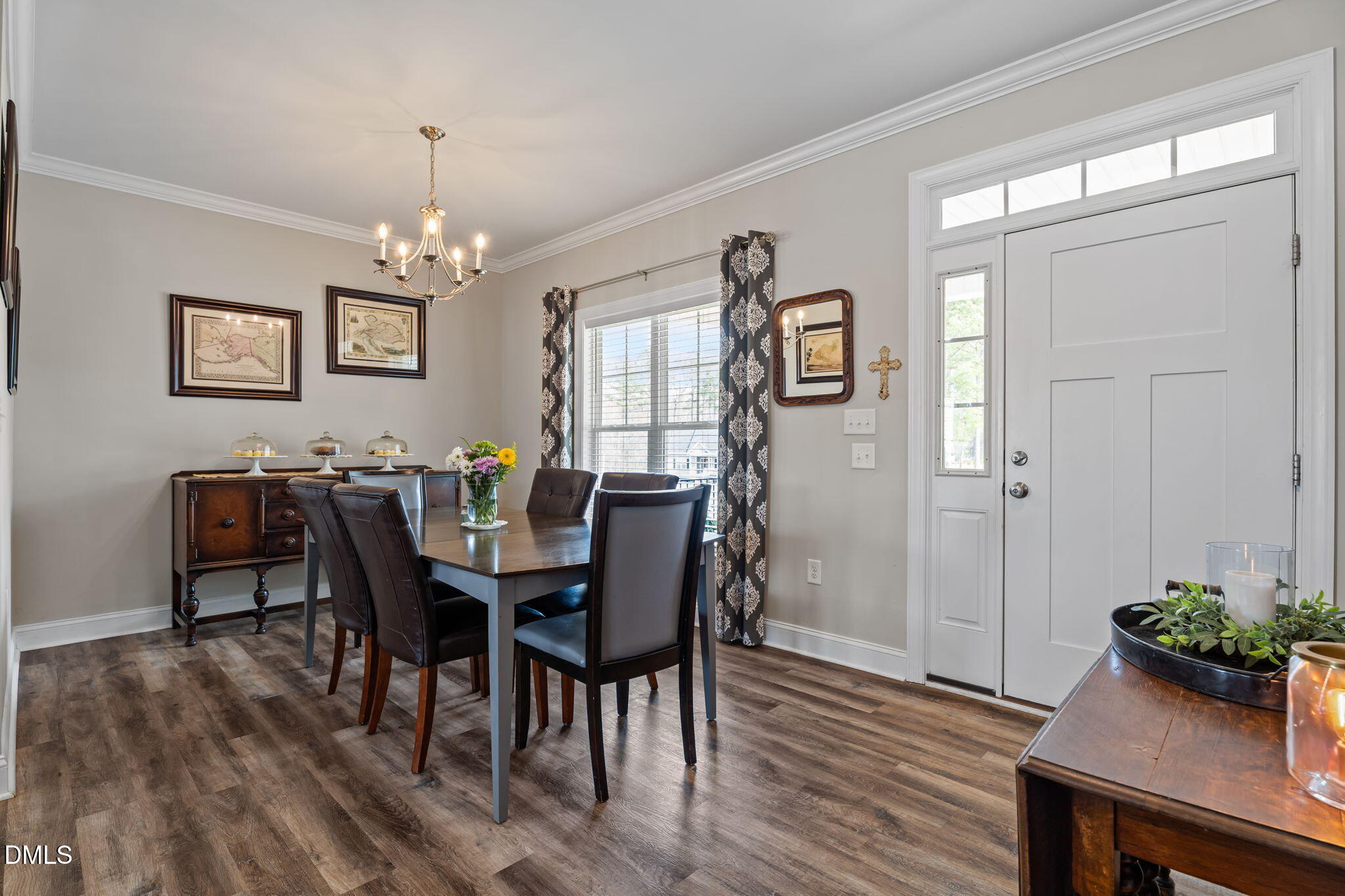 8772 Surrey Top Road Bailey, NC 27807 - Photo 4 of 42 a view of a dining room with furniture window and wooden floor