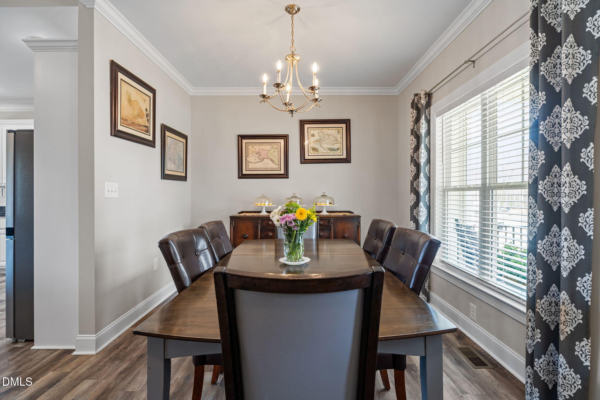 8772 Surrey Top Road Bailey, NC 27807 - Photo 5 of 42 a view of a dining room with furniture window and wooden floor