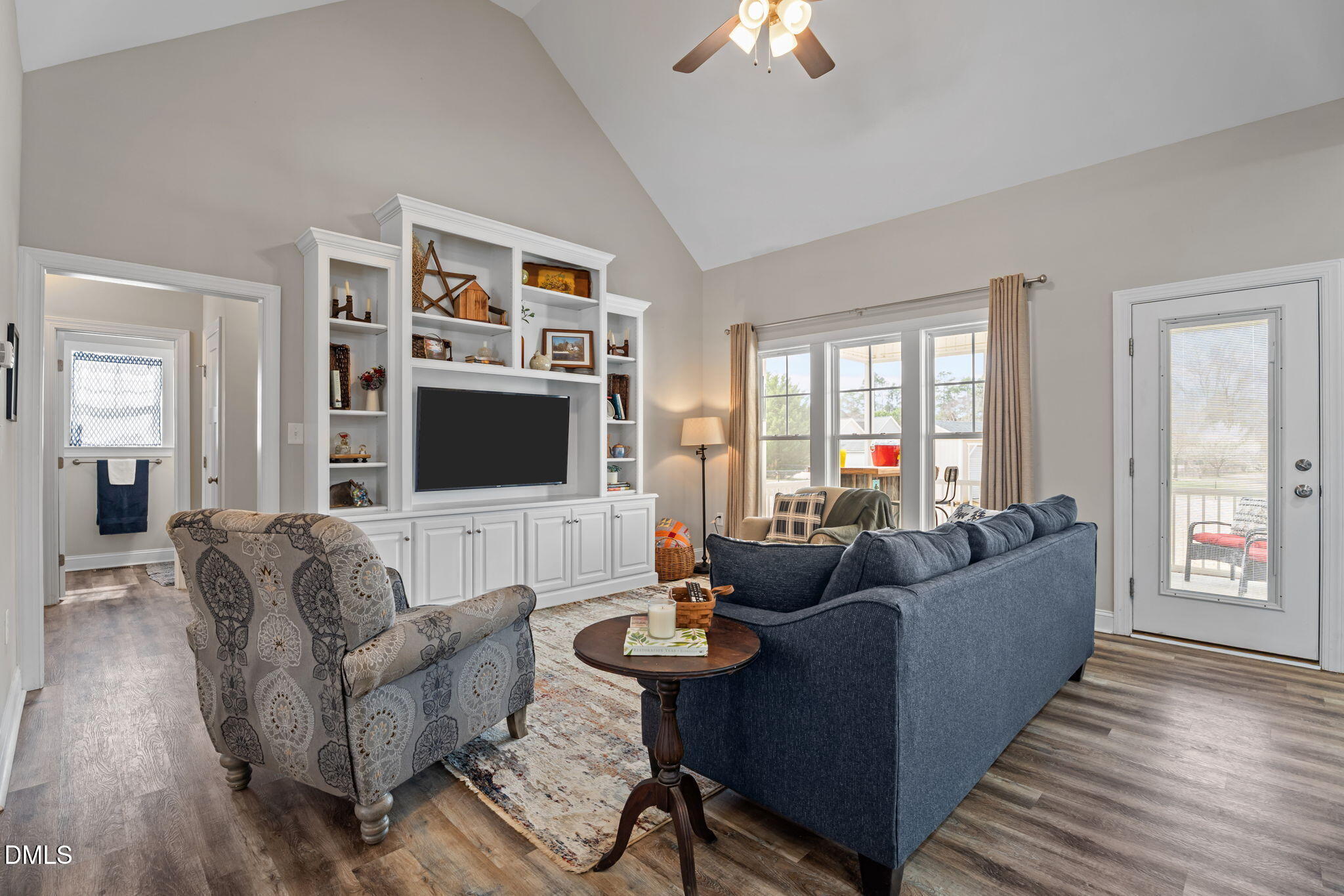 8772 Surrey Top Road Bailey, NC 27807 - Photo 6 of 42 a living room with furniture and a flat screen tv