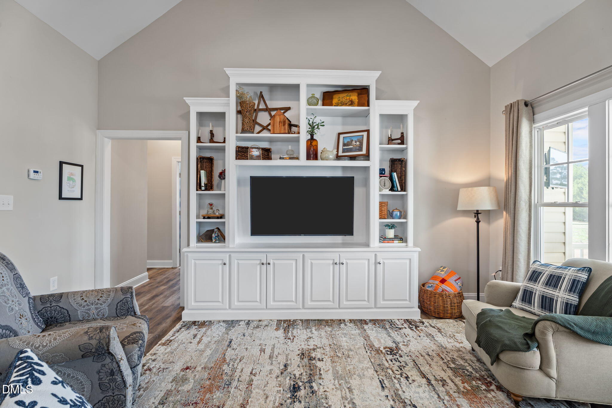 8772 Surrey Top Road Bailey, NC 27807 - Photo 7 of 42 a living room with furniture and a flat screen tv