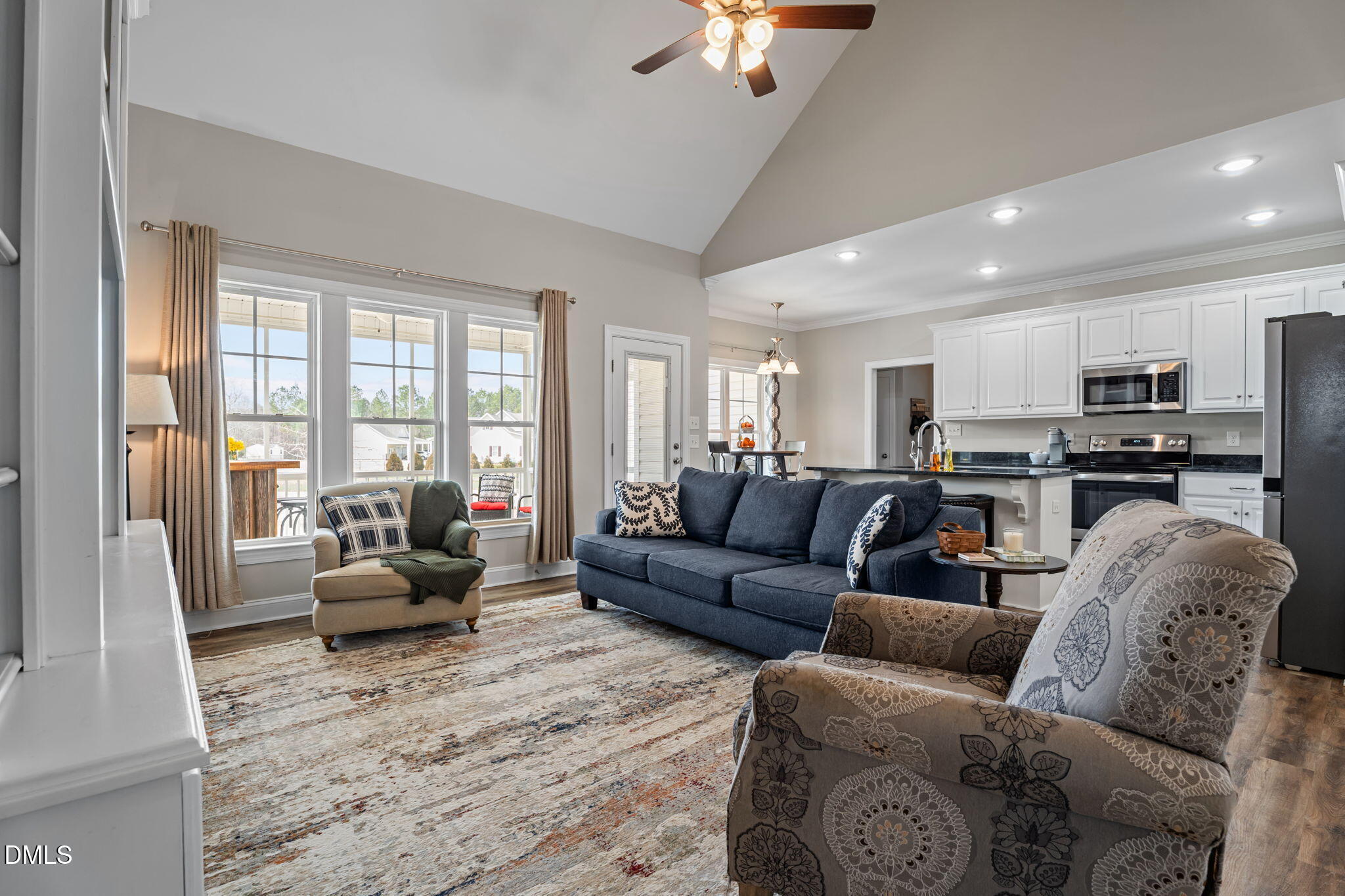 8772 Surrey Top Road Bailey, NC 27807 - Photo 8 of 42 a living room with furniture and a large window
