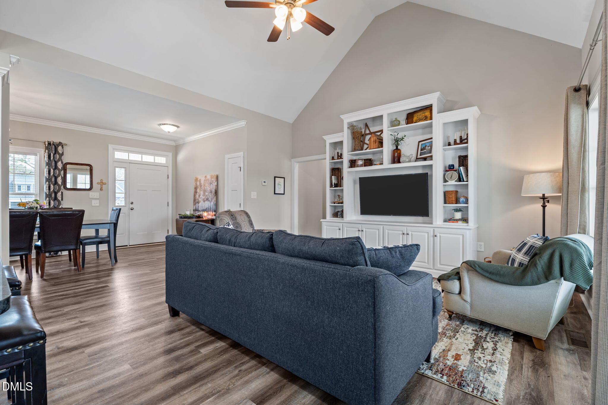 8772 Surrey Top Road Bailey, NC 27807 - Photo 10 of 42 a living room with furniture and a flat screen tv