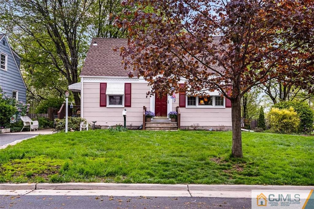 310 Howard Avenue Middlesex, NJ 08846 - Photo 2 of 25 a view of backyard with a garden and entertaining space