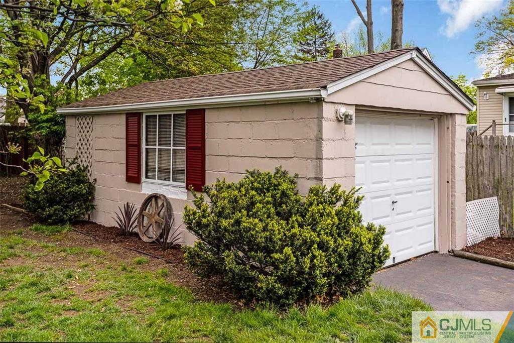 310 Howard Avenue Middlesex, NJ 08846 - Photo 19 of 25 a view of a house with a yard and plants