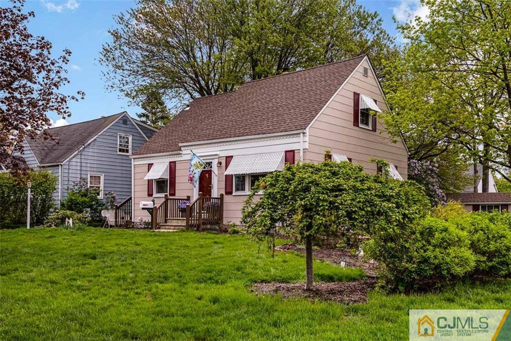 310 Howard Avenue Middlesex, NJ 08846 - Photo 3 of 25 a view of a house with a yard and sitting area