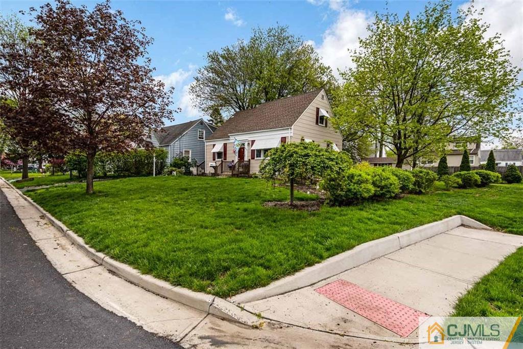 310 Howard Avenue Middlesex, NJ 08846 - Photo 23 of 25 front view of a house with a yard
