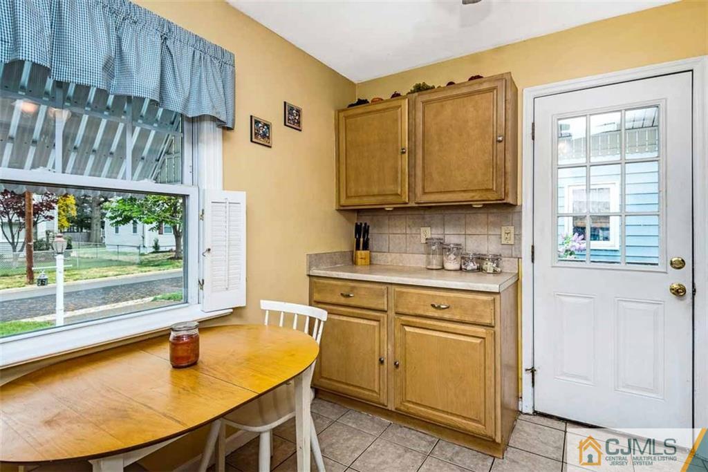 310 Howard Avenue Middlesex, NJ 08846 - Photo 5 of 25 a kitchen with a sink a stove and cabinets