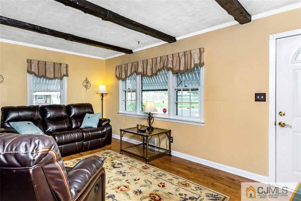 310 Howard Avenue Middlesex, NJ 08846 - Photo 10 of 25 a living room with furniture and a window