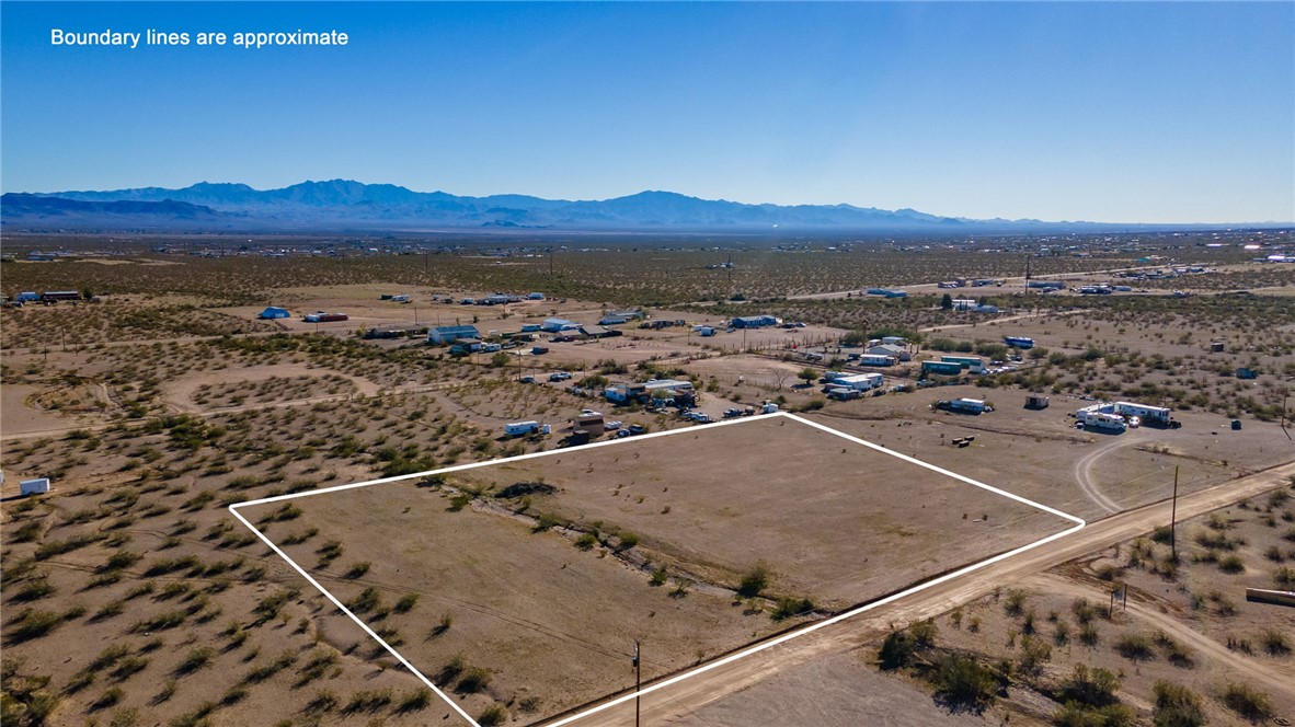 Tbd South Drake Road Golden Valley, AZ 86413 - Photo 3 of 14 an aerial view of residential houses with outdoor space