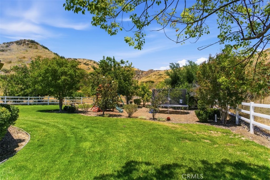 31233 Romero Canyon Road Castaic, CA 91384 - Photo 18 of 38 a view of a park with large trees