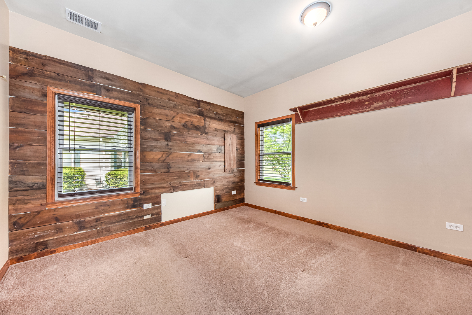 106 Round House Street Braidwood, IL 60408 - Photo 13 of 27 an empty room with windows