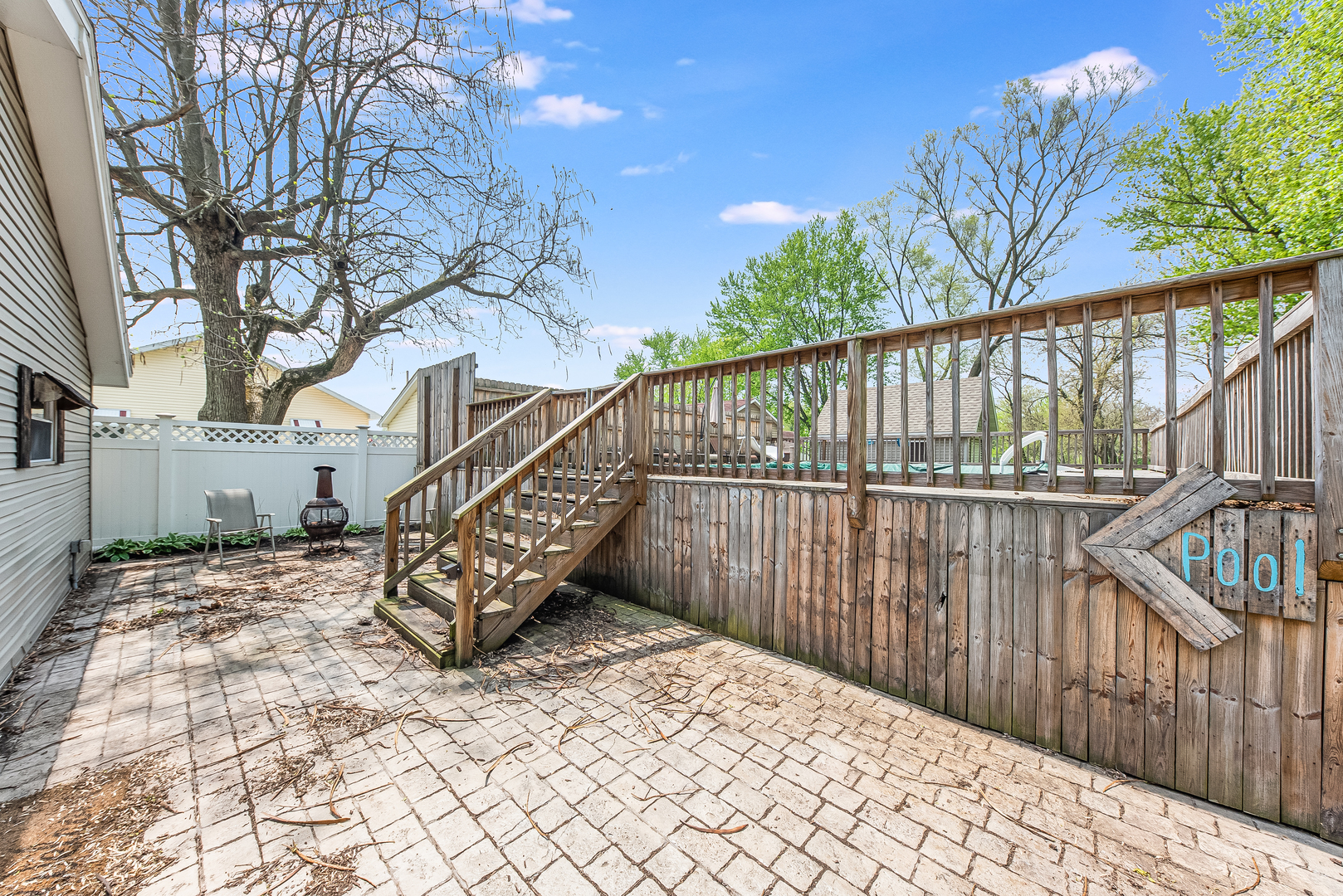 106 Round House Street Braidwood, IL 60408 - Photo 18 of 27 a view of balcony with wooden fence and floor