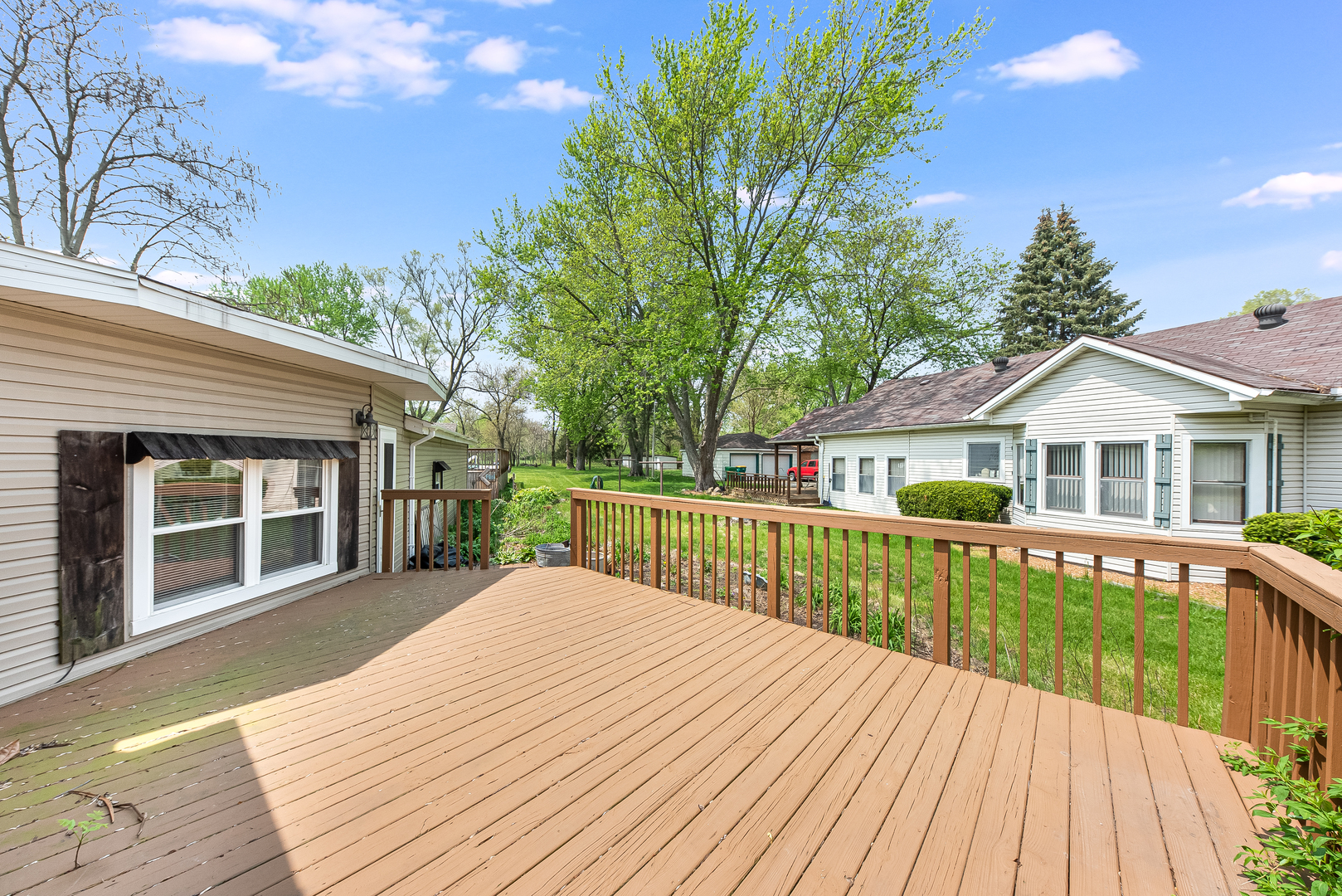106 Round House Street Braidwood, IL 60408 - Photo 22 of 27 a view of a house with a yard