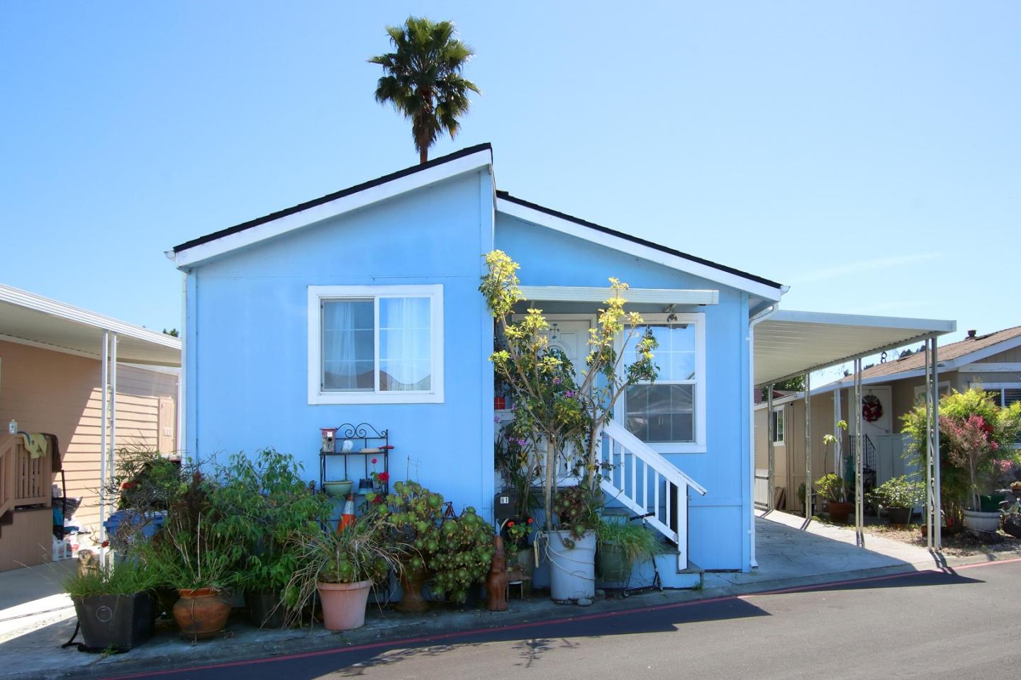 999 Soquel San Jose Road, Unit 81 Soquel, CA 95073 - Photo 2 of 17 a front view of a house with garden