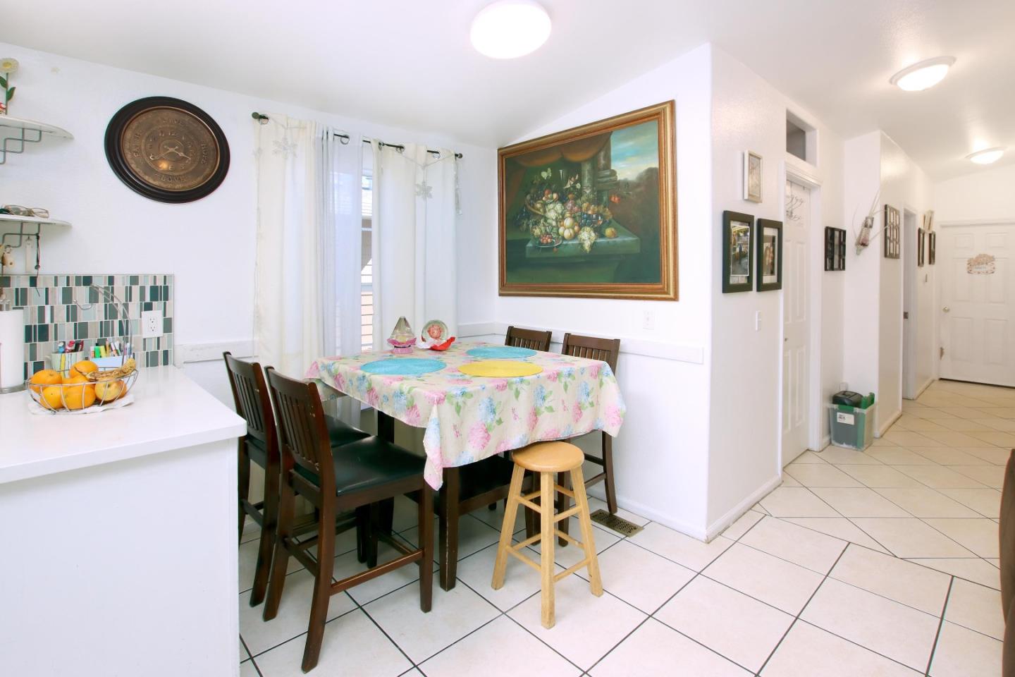 999 Soquel San Jose Road, Unit 81 Soquel, CA 95073 - Photo 6 of 17 a dining room with furniture and chandelier