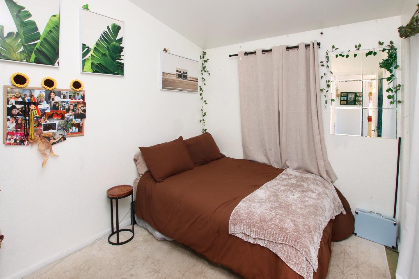999 Soquel San Jose Road, Unit 81 Soquel, CA 95073 - Photo 10 of 17 a bedroom with a bed and a window