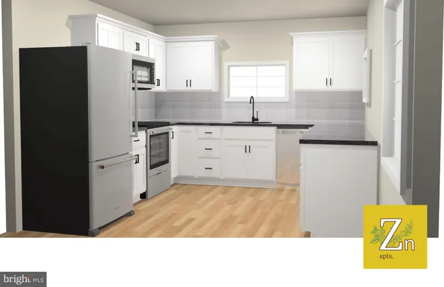 a kitchen with stainless steel appliances granite countertop a refrigerator sink and white cabinets