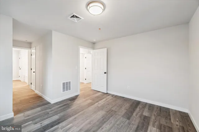 a view of a livingroom with wooden floor